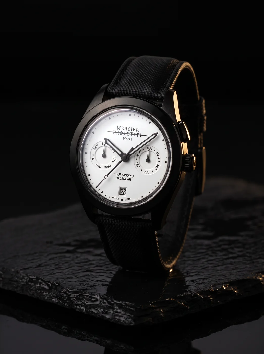 Manx Blanc rim-lit on black stone