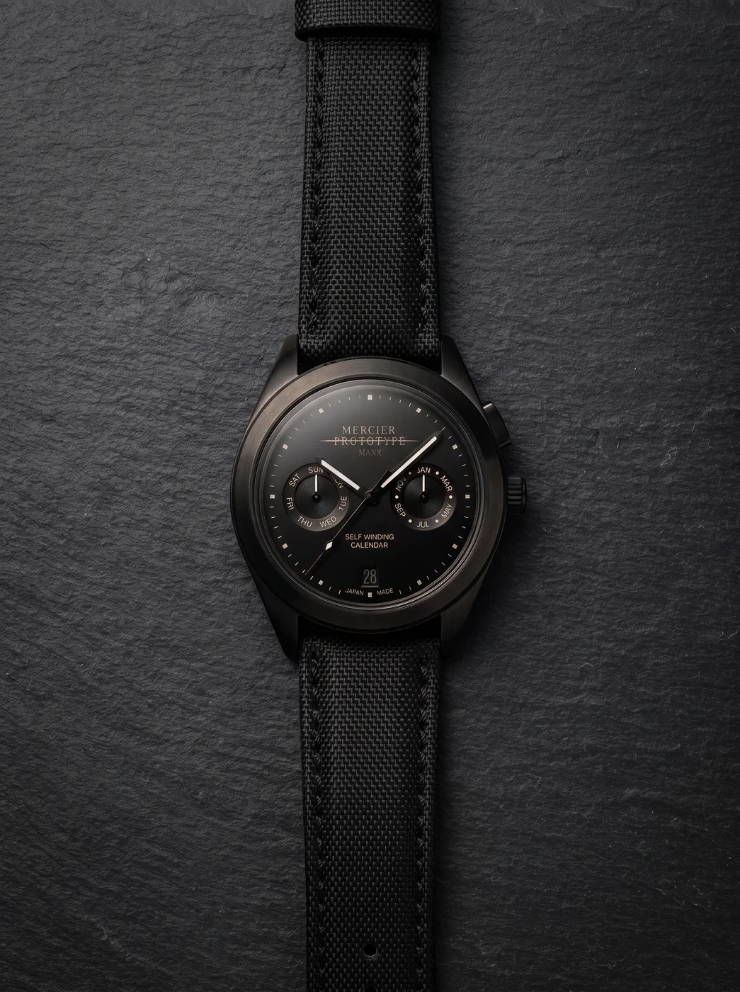 Manx Noir flat lay on slate with field kit