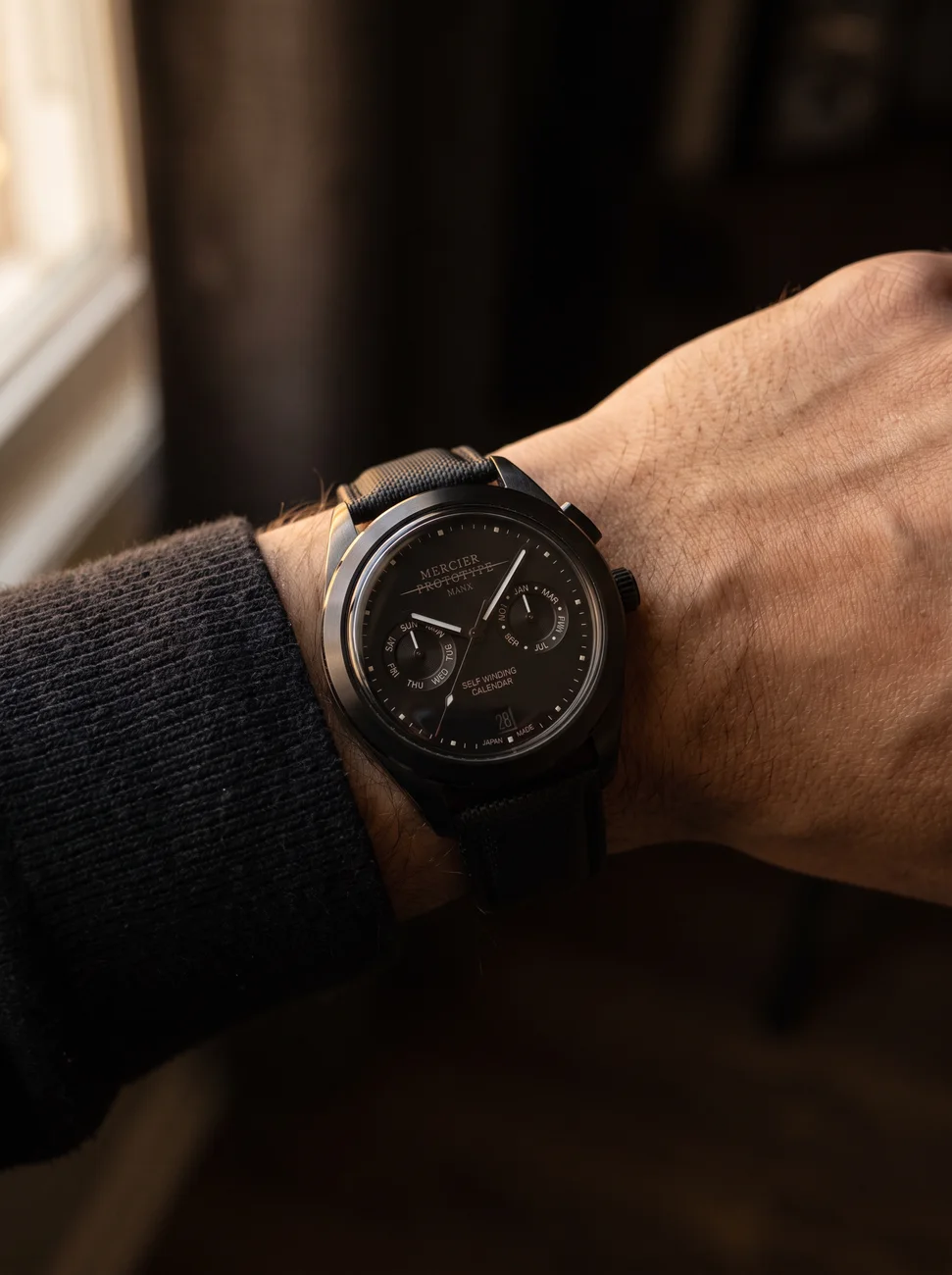 Manx Noir worn on the wrist, sailcloth strap