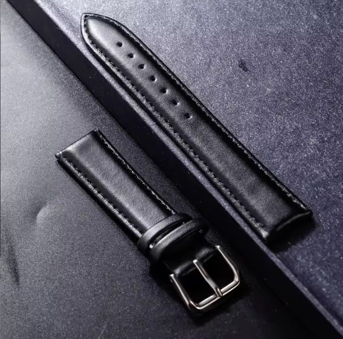 The Leather — full-grain leather strap with steel buckle, fits Manx
